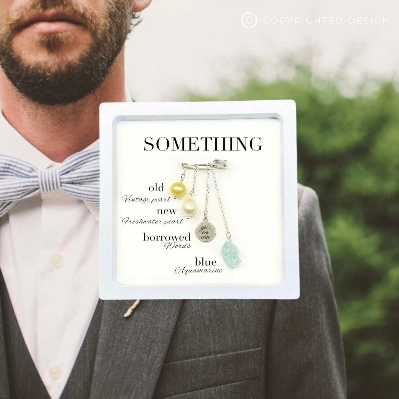 Elegant 'Something Blue' wedding charm, a thoughtful keepsake for gay and lesbian couples. Perfect as a groom gift or a special token for queer weddings.